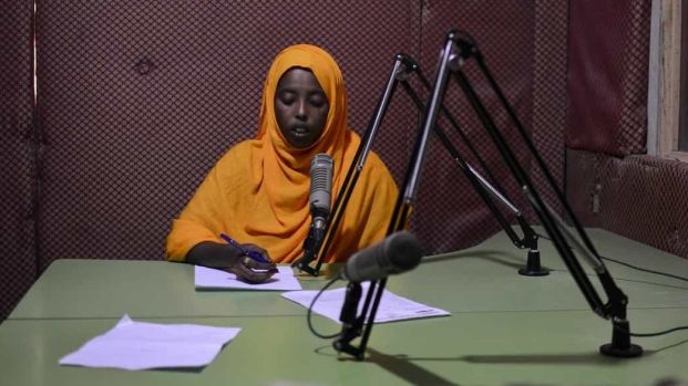 Newsreader in Radio Mogadishu.  ©Tobin Jones/Albany Associates.